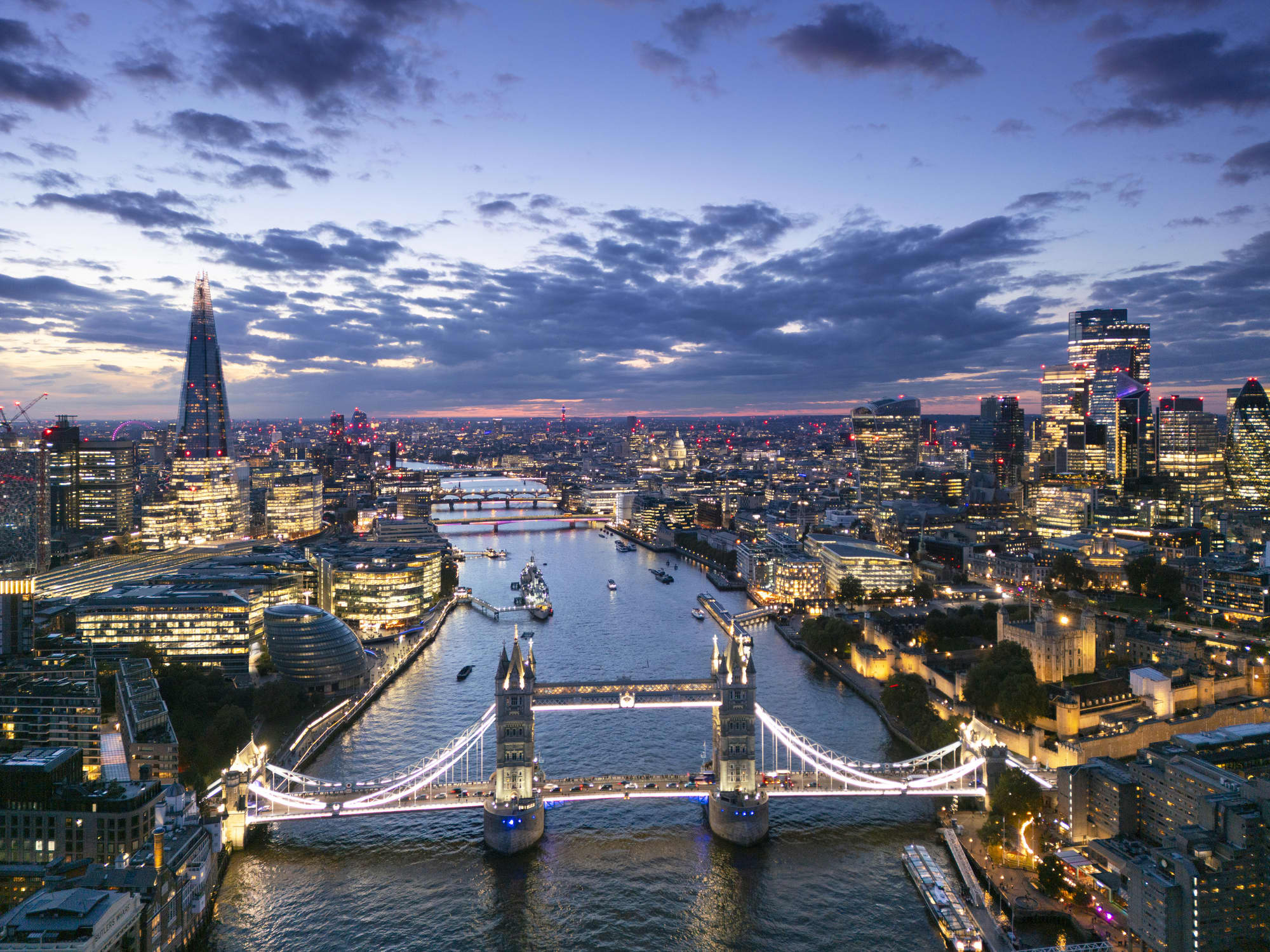 Ellevated view over London's River Thames and city financial district skyline.